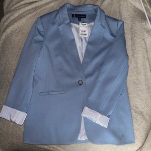 Pale blue women’s blazer with striped cuffs